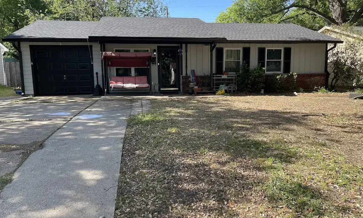 Asphalt Shingle Roof Repair crew at work on a residential roof in Lilburn